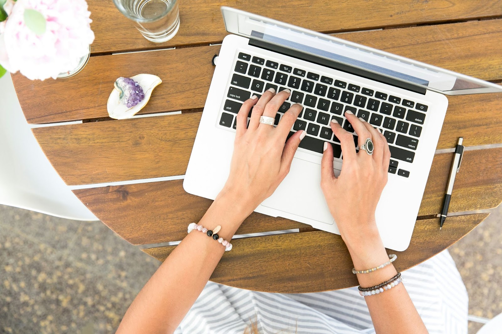 person using a laptop seen from above